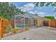 Backyard with a screened-in pool and white rock area, perfect for outdoor relaxation and entertaining at 11726 S Stone Ln, Riverview, FL 33569