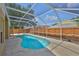 Enjoy the Florida lifestyle with this screened-in pool and fenced-in backyard at 11726 S Stone Ln, Riverview, FL 33569