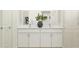 Elegant bathroom featuring dual sinks, white cabinetry, and modern fixtures at 11733 E 71St Ter, Palmetto, FL 34221