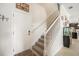Welcoming entryway with a staircase, neutral tones, and decorative accents at 11802 Twilight Darner Pl, Riverview, FL 33569