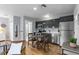 Efficient kitchen with modern cabinets, stainless appliances, and a table for casual dining at 1211 14Th N St, St Petersburg, FL 33705