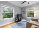 Comfortable living room with natural light and views of the yard, perfect for relaxation at 1211 14Th N St, St Petersburg, FL 33705