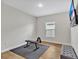 Home gym area with exercise equipment and a window for natural light at 12428 Chaya Ct, Spring Hill, FL 34610