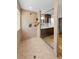 Modern bathroom featuring a glass enclosed shower with tile surround and upgraded hardware at 13544 Avista Dr, Tampa, FL 33624