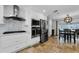 Open kitchen with stainless steel appliances and room for a breakfast table and chairs at 13544 Avista Dr, Tampa, FL 33624