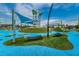 Community playground with colorful structures and shaded areas at 13544 Avista Dr, Tampa, FL 33624