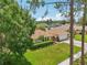 Aerial shot showcasing the home, yard, and surrounding neighborhood at 15005 Roundup Dr, Tampa, FL 33624