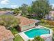 A stunning backyard pool and patio offer a private oasis for relaxation and entertainment at 15005 Roundup Dr, Tampa, FL 33624