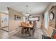 Inviting dining room area showcases an abundance of natural light and tiled floors at 15005 Roundup Dr, Tampa, FL 33624