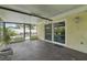 Spacious screened lanai with views of the pool and backyard, perfect for outdoor living at 15005 Roundup Dr, Tampa, FL 33624