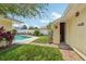 Backyard pool view with convenient outdoor restroom facility at 15005 Roundup Dr, Tampa, FL 33624