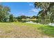Beautiful lake view with lush greenery and trees at 16112 N 15Th St, Lutz, FL 33549