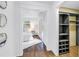 Bedroom view into closet with shelving at 1753 San Mateo Dr, Dunedin, FL 34698
