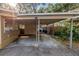 Covered carport area providing ample parking and storage at 1753 San Mateo Dr, Dunedin, FL 34698