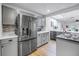 Spacious kitchen with stainless steel appliances and ample counter space and cabinetry at 1753 San Mateo Dr, Dunedin, FL 34698