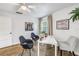 Office space features wood floors, a window, modern furniture, and decor at 1753 San Mateo Dr, Dunedin, FL 34698