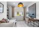 Flex room featuring a comfortable daybed, modern desk, and contemporary decor at 17881 Star Ruby Pl, Nokomis, FL 34275