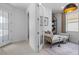Bright flex room with modern furniture, including a daybed and stylish decor at 17881 Star Ruby Pl, Nokomis, FL 34275