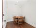 Bright dining room featuring wood floors and a round table with seating for five at 1805 W Jetton Ave, Tampa, FL 33606