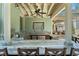 Covered outdoor kitchen with stainless steel appliances and bar seating at 1805 W Jetton Ave, Tampa, FL 33606