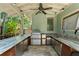 Outdoor kitchen featuring stainless steel appliances and granite countertops at 1805 W Jetton Ave, Tampa, FL 33606