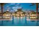 Resort-style pool featuring beautiful fountains, palm trees and plenty of seating for relaxing at 18913 Indian Rock Pl, Lakewood Ranch, FL 34211