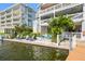 Serene backyard with cozy seating area, providing a peaceful retreat with picturesque waterfront views at 20019 Gulf Blvd # 1, Indian Shores, FL 33785