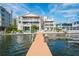 Waterfront property featuring a private boat dock, perfect for boating and enjoying the beautiful water views at 20019 Gulf Blvd # 1, Indian Shores, FL 33785