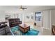 Living room with access to balcony and beautiful water views at 20019 Gulf Blvd # 1, Indian Shores, FL 33785