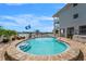 Beautiful waterfront pool offers a refreshing escape with its clear water and brick-paved surrounding at 20019 Gulf Blvd # 1, Indian Shores, FL 33785