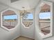Unique, decorative chandelier and windows with water views at 20019 Gulf Blvd # 1, Indian Shores, FL 33785