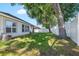 View of the grassy backyard and fencing creating a private outdoor living space at 203 Montara Dr, Seffner, FL 33584
