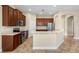 Spacious kitchen with stainless steel appliances and abundant wood cabinetry at 203 Montara Dr, Seffner, FL 33584