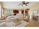 Open living space featuring kitchen, dining, and living areas with cohesive design at 203 Montara Dr, Seffner, FL 33584