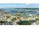 Stunning aerial view of waterfront homes with private boat docks and gorgeous water views at 215 18Th Ave, Indian Rocks Beach, FL 33785