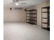 Unfinished basement space featuring durable flooring and exposed shelving, perfect for storage or customization at 215 18Th Ave, Indian Rocks Beach, FL 33785