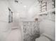 Elegant bathroom featuring modern marble accents, separate shower, and stylish fixtures at 215 18Th Ave, Indian Rocks Beach, FL 33785