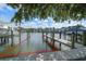 Private dock with boat lift offering direct access to the Intracoastal waterway at 215 18Th Ave, Indian Rocks Beach, FL 33785