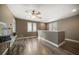 Open loft space with bright windows, a ceiling fan, and durable wood flooring at 215 18Th Ave, Indian Rocks Beach, FL 33785