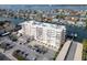 Luxury waterfront building featuring a sophisticated design, convenient parking, and stunning water views at 223 Island Way # 7F, Clearwater Beach, FL 33767
