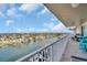 Balcony overlooking water view with seating for outdoor enjoyment at 223 Island Way # 7F, Clearwater Beach, FL 33767