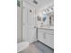 Clean bathroom featuring a white vanity, tile flooring, and a modern toilet at 223 Island Way # 7F, Clearwater Beach, FL 33767