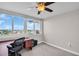 Inviting bedroom with a large window overlooking scenic views and a desk area at 223 Island Way # 7F, Clearwater Beach, FL 33767