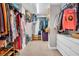 Walk-in closet with ample storage space and built-in organizers for clothing, shoes, and accessories at 223 Island Way # 7F, Clearwater Beach, FL 33767