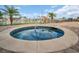Enjoy a relaxing soak in the hot tub, surrounded by lush landscaping and serene views at 223 Island Way # 7F, Clearwater Beach, FL 33767