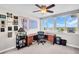 Bright and functional office space with a large window and a comfortable workstation at 223 Island Way # 7F, Clearwater Beach, FL 33767