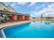 Enjoy a refreshing swim in the pool; with a pergola-covered lounging area at 223 Island Way # 7F, Clearwater Beach, FL 33767