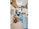 Organized walk-in closet featuring shelving for storage and ample space at 223 Island Way # 7F, Clearwater Beach, FL 33767