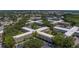 An aerial view of this apartment complex provides a bird's eye view of its unique architecture and community setting at 2441 Persian Dr # 61, Clearwater, FL 33763