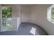 Outdoor balcony with railings and view of surrounding trees at 2441 Persian Dr # 61, Clearwater, FL 33763